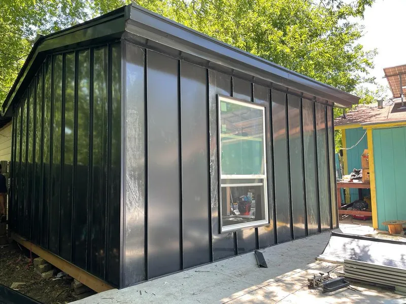 Black standing seam metal wall panels for Metal Roof Installation in Levelland