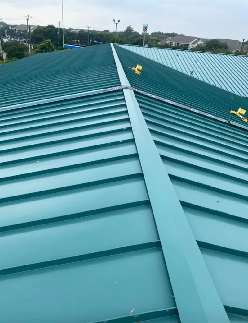 Green commercial metal roof ridge and valley for Metal Roof Repair in Levelland
