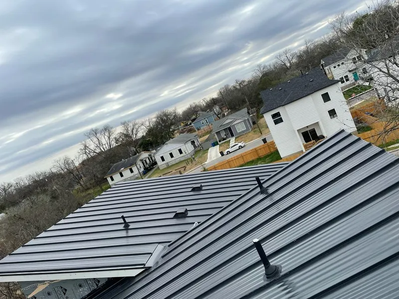 Standing seam metal roof panels with vents for Skylight Repair in Levelland
